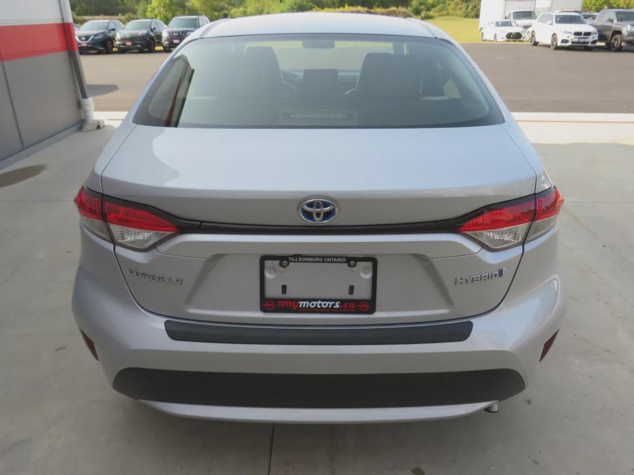 2021 Toyota Corolla Hybrid  | Very Low Km | Clean Title | No Accidents | Safety Certified | Hybrid | Leather | Wireless Phone Charging | Push Button Start | Power Seats | Reverse Camera | Digital Touchscreen | Drive Modes | Heated Seats | Digital Climate Control Photo