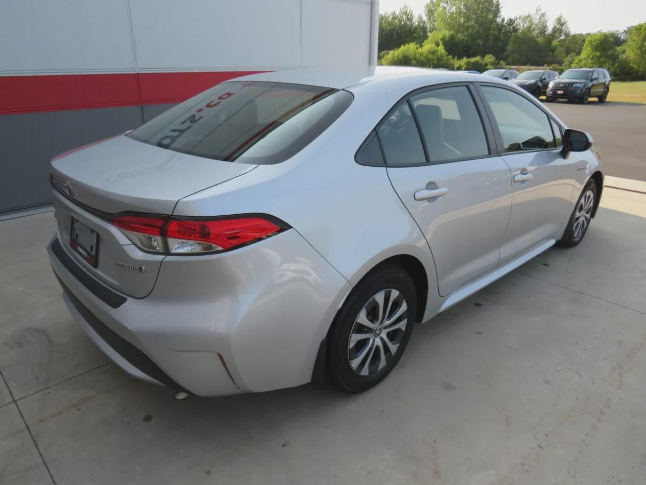 2021 Toyota Corolla Hybrid  | Very Low Km | Clean Title | No Accidents | Safety Certified | Hybrid | Leather | Wireless Phone Charging | Push Button Start | Power Seats | Reverse Camera | Digital Touchscreen | Drive Modes | Heated Seats | Digital Climate Control Photo