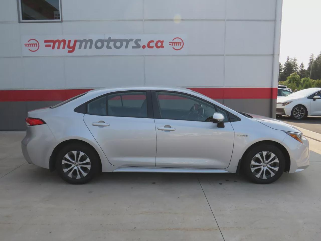 2021 Toyota Corolla Hybrid  | Very Low Km | Clean Title | No Accidents | Safety Certified | Hybrid | Leather | Wireless Phone Charging | Push Button Start | Power Seats | Reverse Camera | Digital Touchscreen | Drive Modes | Heated Seats | Digital Climate Control Photo