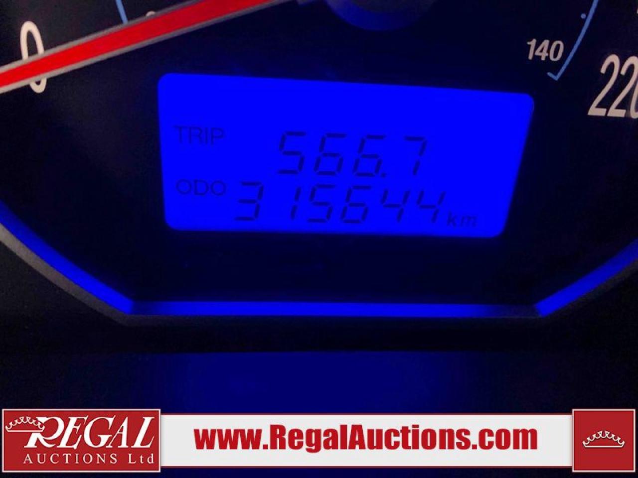 12956327