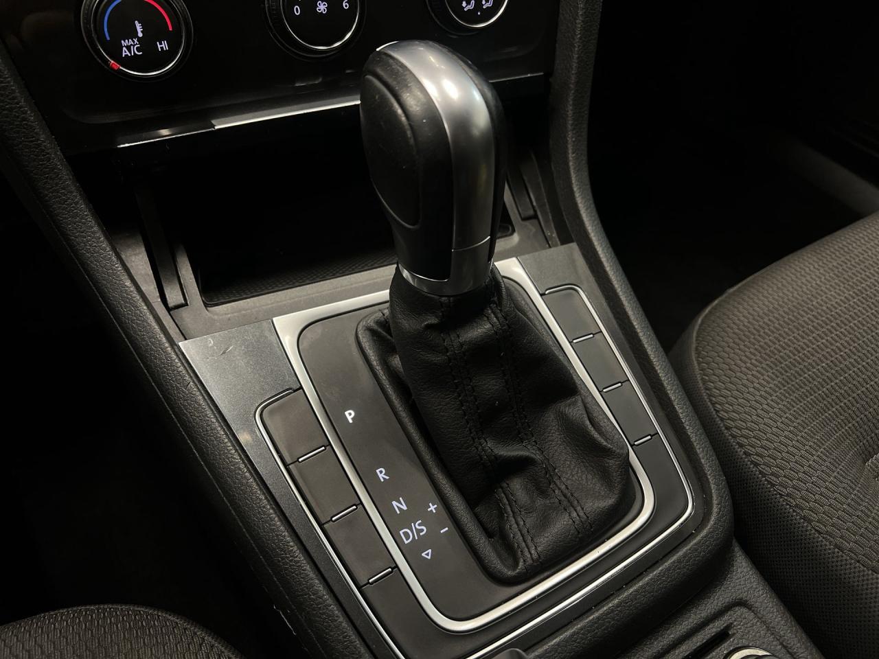 12957411