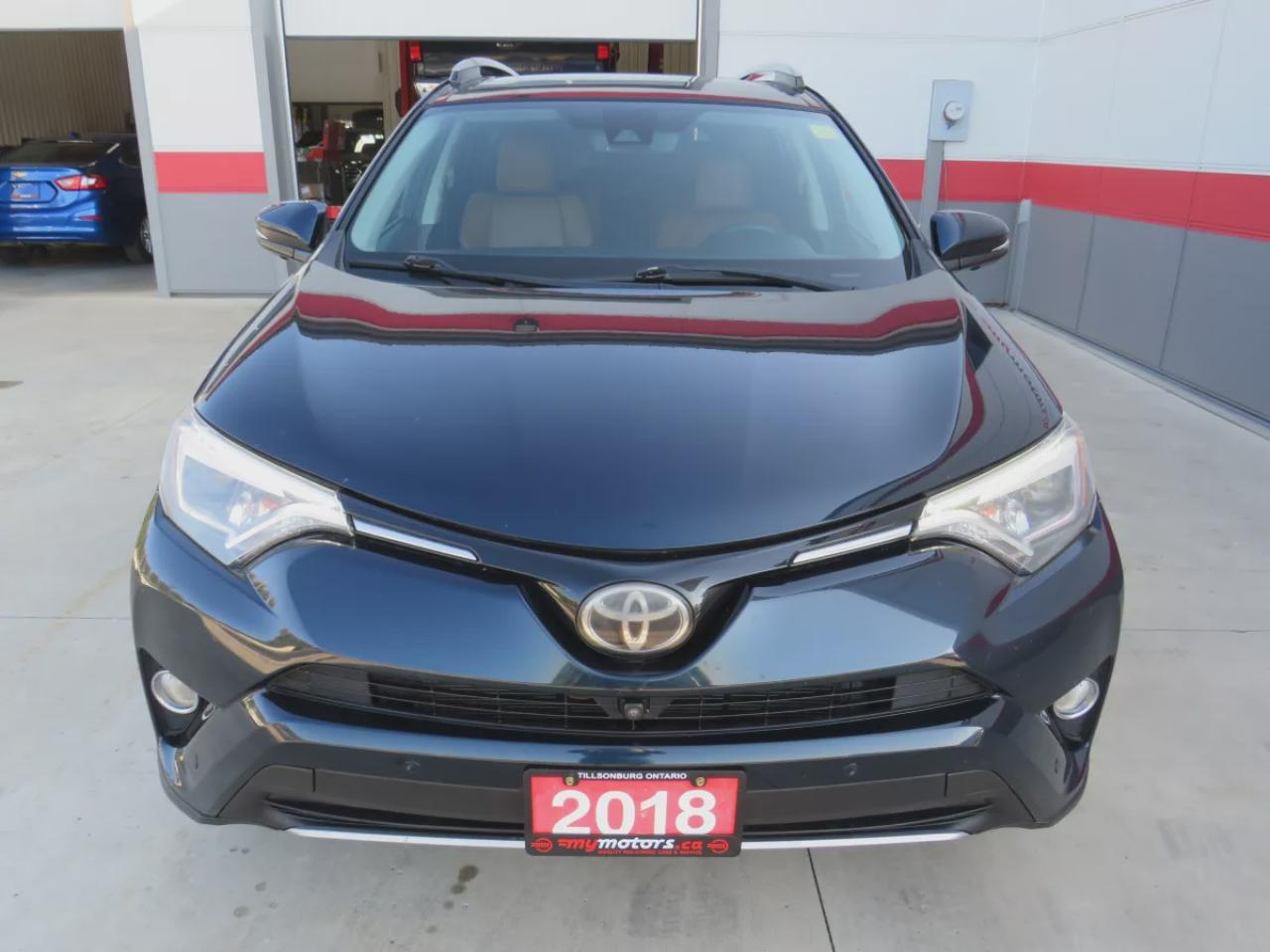 2018 Toyota RAV4 Limited (**CLEAN TITLE/NO ACCIDENTS!!**SAFETY/CERTIFIED!!**AWD**ALLOY RIMS**TWO-TONE LEATHER**SUNROOF**NAVIGATION**REVERSE CAMERA**DUAL CLIMATE CONTROL**ECO AND SPORT MODE**HEATED SEATS/STEERING WHEEL**LANE ASSIST**AWD LOCK**PUSH BUTTON START**DIGITAL TOU Photo