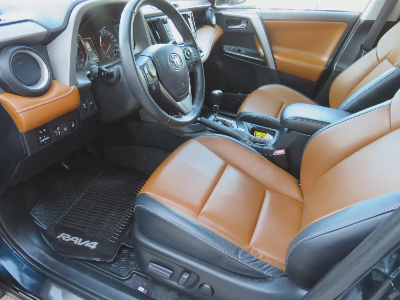 2018 Toyota RAV4 Limited (**CLEAN TITLE/NO ACCIDENTS!!**SAFETY/CERTIFIED!!**AWD**ALLOY RIMS**TWO-TONE LEATHER**SUNROOF**NAVIGATION**REVERSE CAMERA**DUAL CLIMATE CONTROL**ECO AND SPORT MODE**HEATED SEATS/STEERING WHEEL**LANE ASSIST**AWD LOCK**PUSH BUTTON START**DIGITAL TOU Photo