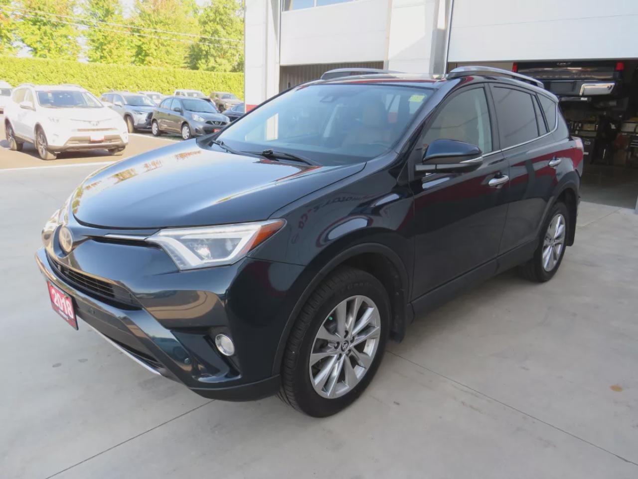 2018 Toyota RAV4 Limited (**CLEAN TITLE/NO ACCIDENTS!!**SAFETY/CERTIFIED!!**AWD**ALLOY RIMS**TWO-TONE LEATHER**SUNROOF**NAVIGATION**REVERSE CAMERA**DUAL CLIMATE CONTROL**ECO AND SPORT MODE**HEATED SEATS/STEERING WHEEL**LANE ASSIST**AWD LOCK**PUSH BUTTON START**DIGITAL TOU Photo