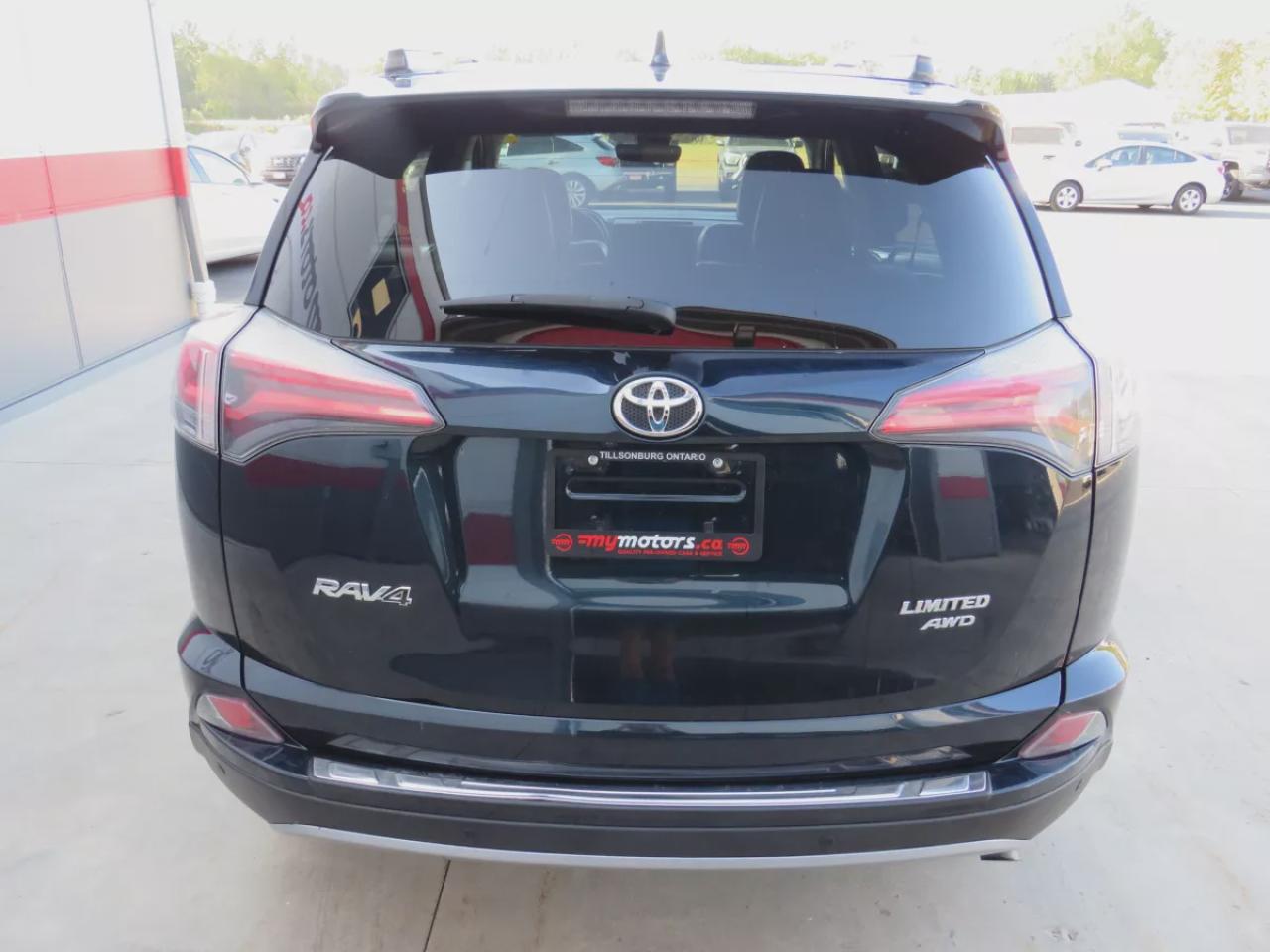 2018 Toyota RAV4 Limited (**CLEAN TITLE/NO ACCIDENTS!!**SAFETY/CERTIFIED!!**AWD**ALLOY RIMS**TWO-TONE LEATHER**SUNROOF**NAVIGATION**REVERSE CAMERA**DUAL CLIMATE CONTROL**ECO AND SPORT MODE**HEATED SEATS/STEERING WHEEL**LANE ASSIST**AWD LOCK**PUSH BUTTON START**DIGITAL TOU Photo
