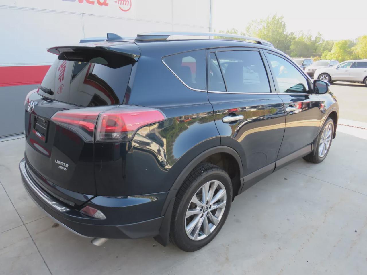 2018 Toyota RAV4 Limited (**CLEAN TITLE/NO ACCIDENTS!!**SAFETY/CERTIFIED!!**AWD**ALLOY RIMS**TWO-TONE LEATHER**SUNROOF**NAVIGATION**REVERSE CAMERA**DUAL CLIMATE CONTROL**ECO AND SPORT MODE**HEATED SEATS/STEERING WHEEL**LANE ASSIST**AWD LOCK**PUSH BUTTON START**DIGITAL TOU Photo