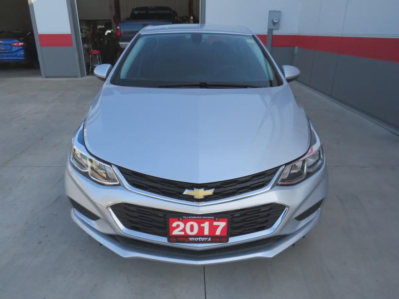 2017 Chevrolet Cruze LS (**VERY LOW KM!!**ONE OWNER!!**CLEAN TITLE/NO ACCIDENTS!!**SAFETY/CERTIFIED!!**AUTOMATIC**A/C**POWER DOORS/LOOCKS**REVERSE CAMERA** DIGITAL TOUCHSCREEN**CRUISE CONTROL**BLUETOOTH**) Photo