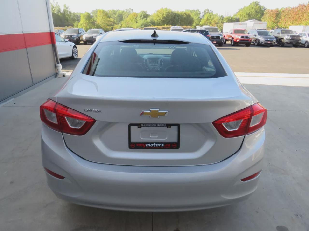 2017 Chevrolet Cruze LS (**VERY LOW KM!!**ONE OWNER!!**CLEAN TITLE/NO ACCIDENTS!!**SAFETY/CERTIFIED!!**AUTOMATIC**A/C**POWER DOORS/LOOCKS**REVERSE CAMERA** DIGITAL TOUCHSCREEN**CRUISE CONTROL**BLUETOOTH**) Photo