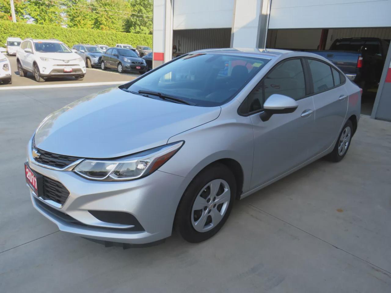 2017 Chevrolet Cruze LS (**VERY LOW KM!!**ONE OWNER!!**CLEAN TITLE/NO ACCIDENTS!!**SAFETY/CERTIFIED!!**AUTOMATIC**A/C**POWER DOORS/LOOCKS**REVERSE CAMERA** DIGITAL TOUCHSCREEN**CRUISE CONTROL**BLUETOOTH**) Photo