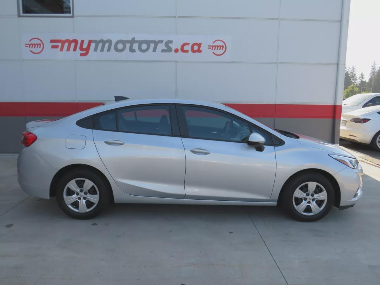 2017 Chevrolet Cruze LS (**VERY LOW KM!!**ONE OWNER!!**CLEAN TITLE/NO ACCIDENTS!!**SAFETY/CERTIFIED!!**AUTOMATIC**A/C**POWER DOORS/LOOCKS**REVERSE CAMERA** DIGITAL TOUCHSCREEN**CRUISE CONTROL**BLUETOOTH**) Photo