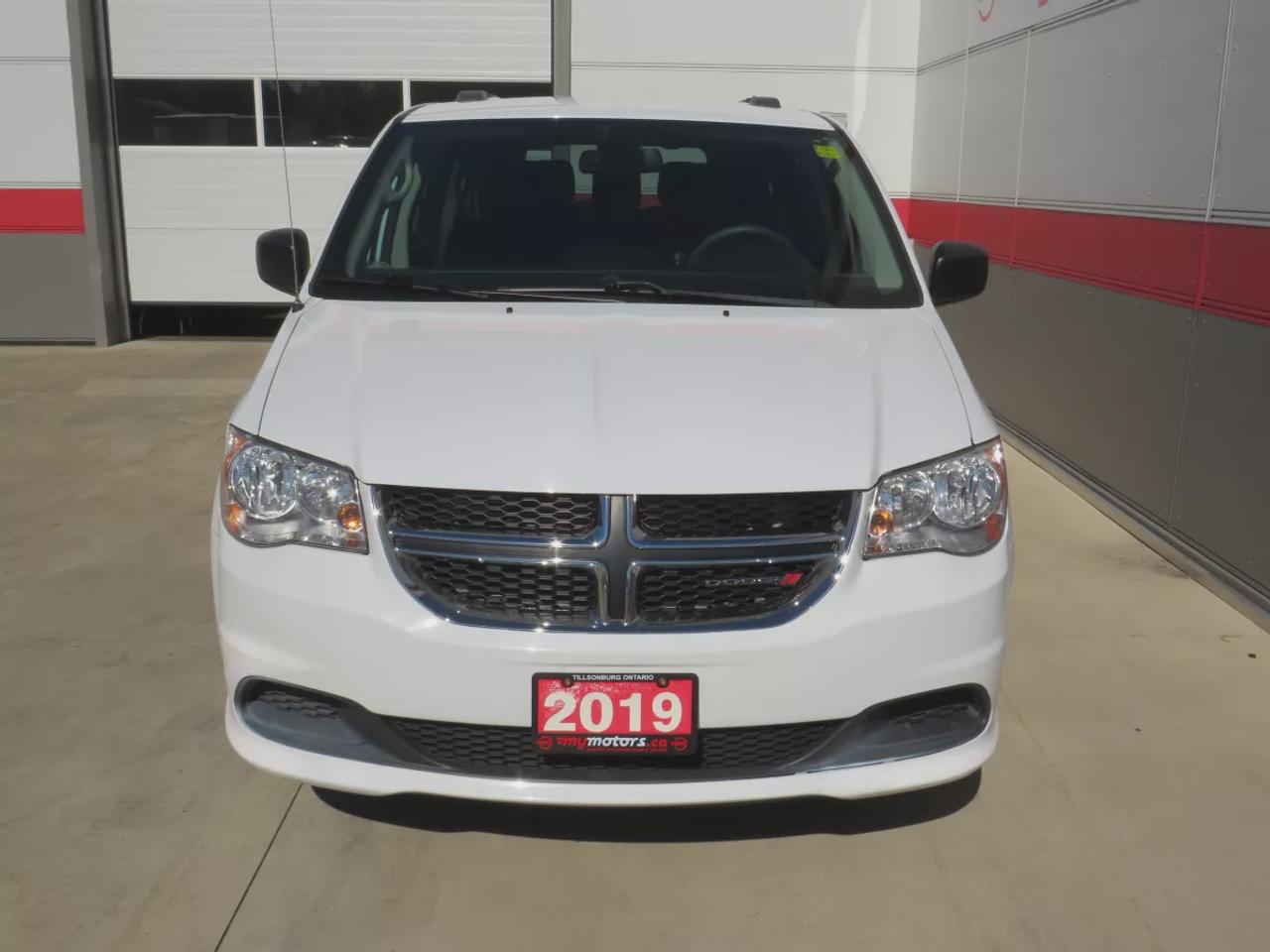 2019 Dodge Grand Caravan SXT  | Safety Certified | 7 Passenger | DVD Entertainment System | Tints | Alloy Rims | Stow&Go Seating | Digital Touchscreen | Reverse Camera | AUX | Bluetooth | Cruise Control Photo