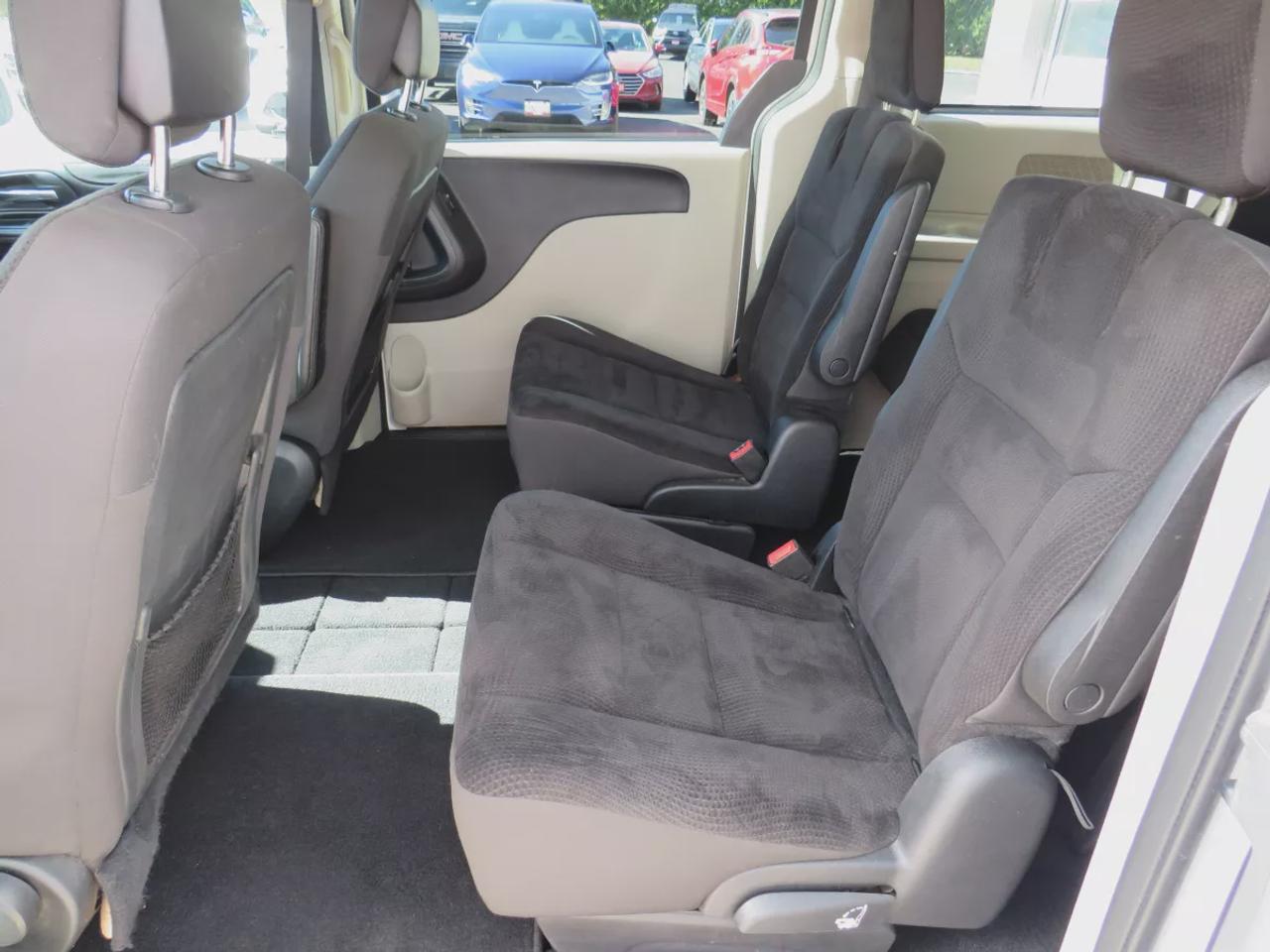 2019 Dodge Grand Caravan SXT  | Safety Certified | 7 Passenger | DVD Entertainment System | Tints | Alloy Rims | Stow&Go Seating | Digital Touchscreen | Reverse Camera | AUX | Bluetooth | Cruise Control Photo