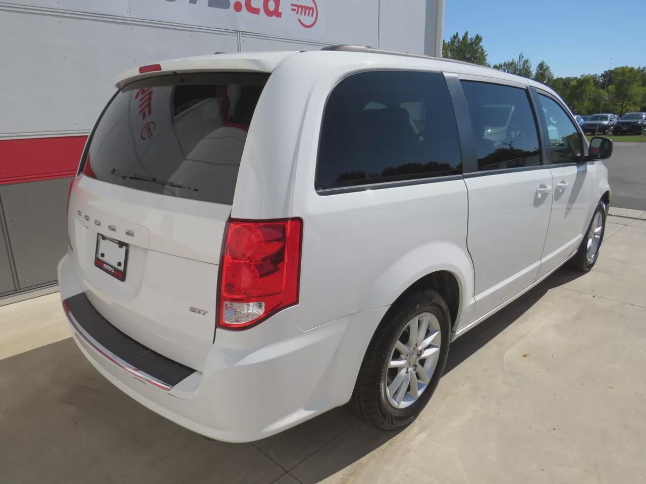 2019 Dodge Grand Caravan SXT  | Safety Certified | 7 Passenger | DVD Entertainment System | Tints | Alloy Rims | Stow&Go Seating | Digital Touchscreen | Reverse Camera | AUX | Bluetooth | Cruise Control Photo