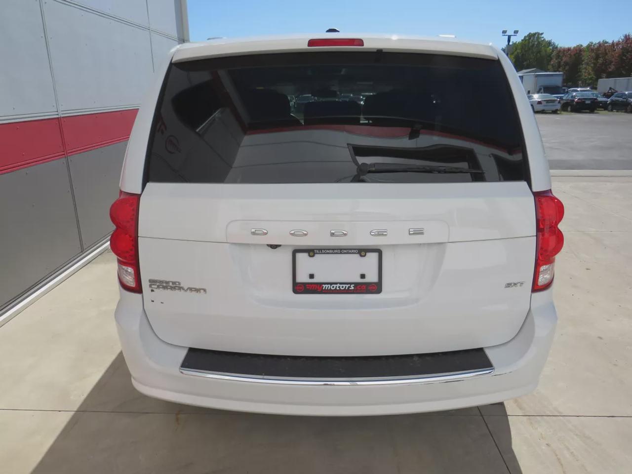 2019 Dodge Grand Caravan SXT  | Safety Certified | 7 Passenger | DVD Entertainment System | Tints | Alloy Rims | Stow&Go Seating | Digital Touchscreen | Reverse Camera | AUX | Bluetooth | Cruise Control Photo