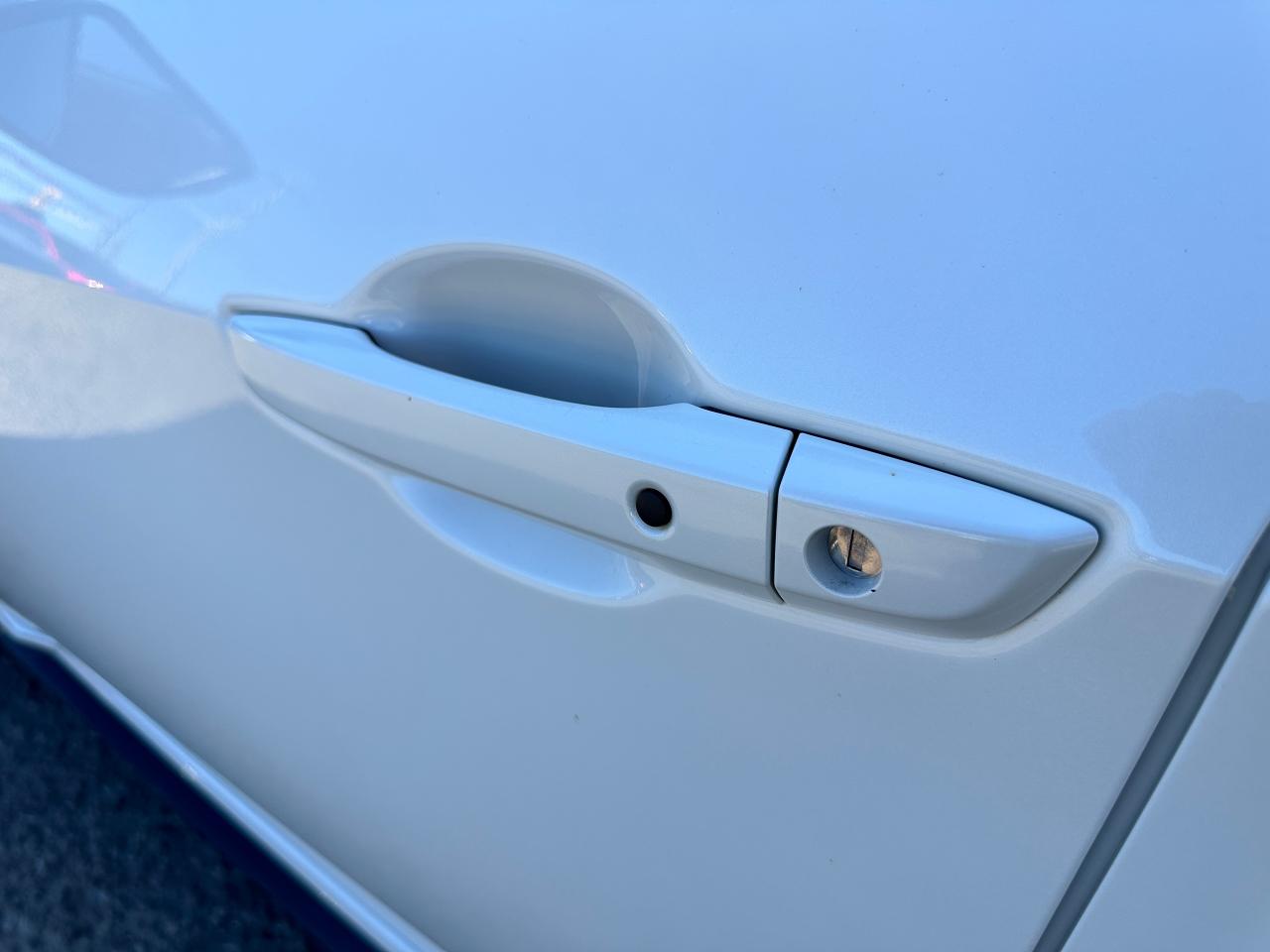 2018 Honda Civic Sport Honda Sensing Sunroof CarPlay RearCam A/C FM Photo