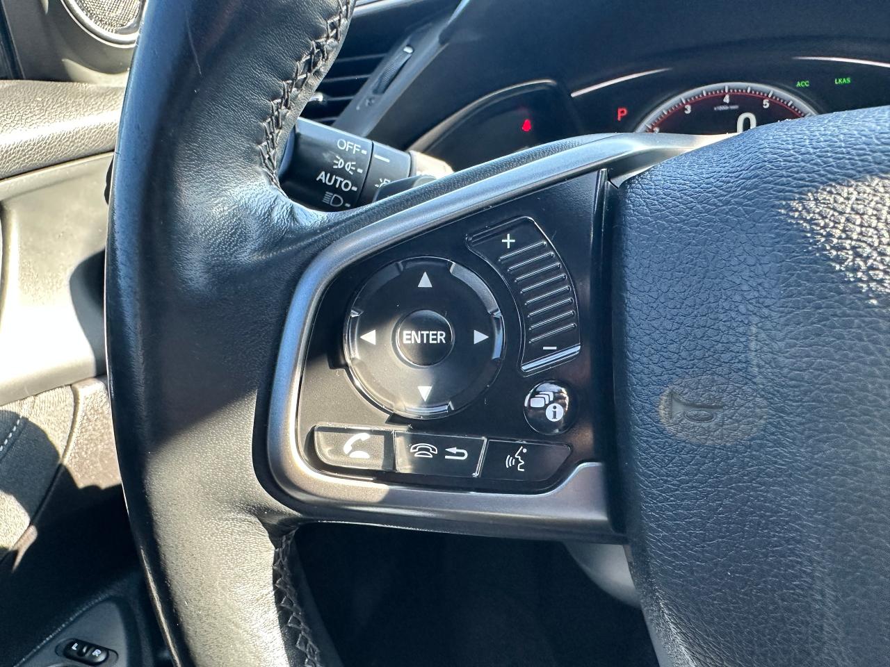 2018 Honda Civic Sport Honda Sensing Sunroof CarPlay RearCam A/C FM Photo