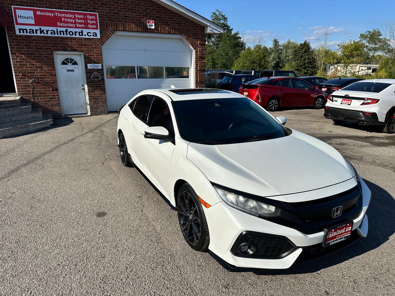 2018 Honda Civic Sport Honda Sensing Sunroof CarPlay RearCam A/C FM Photo