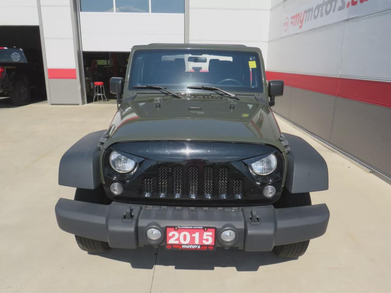 2015 Jeep Wrangler Sport (**SAFETY/CERTIFIED!!**MANUAL TRANSMISSION**4WD**ALLOY RIMS**RUNNING BOARDS**TRAILER HITCH**SOFT TOP**CUSTOM JEEP RUBBER FLOOR MATS**CRUISE CONTROL**) Photo