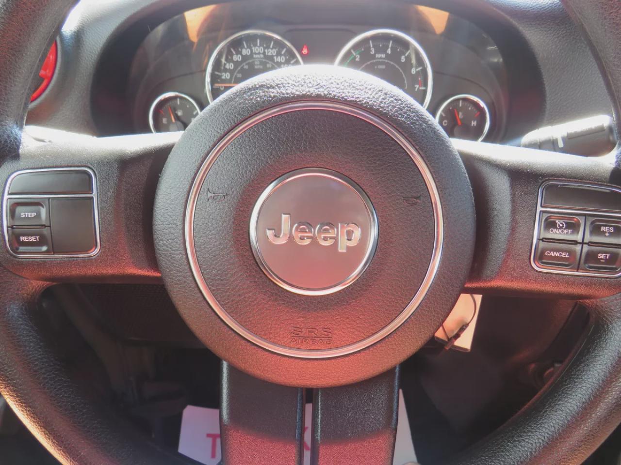 2015 Jeep Wrangler Sport (**SAFETY/CERTIFIED!!**MANUAL TRANSMISSION**4WD**ALLOY RIMS**RUNNING BOARDS**TRAILER HITCH**SOFT TOP**CUSTOM JEEP RUBBER FLOOR MATS**CRUISE CONTROL**) Photo