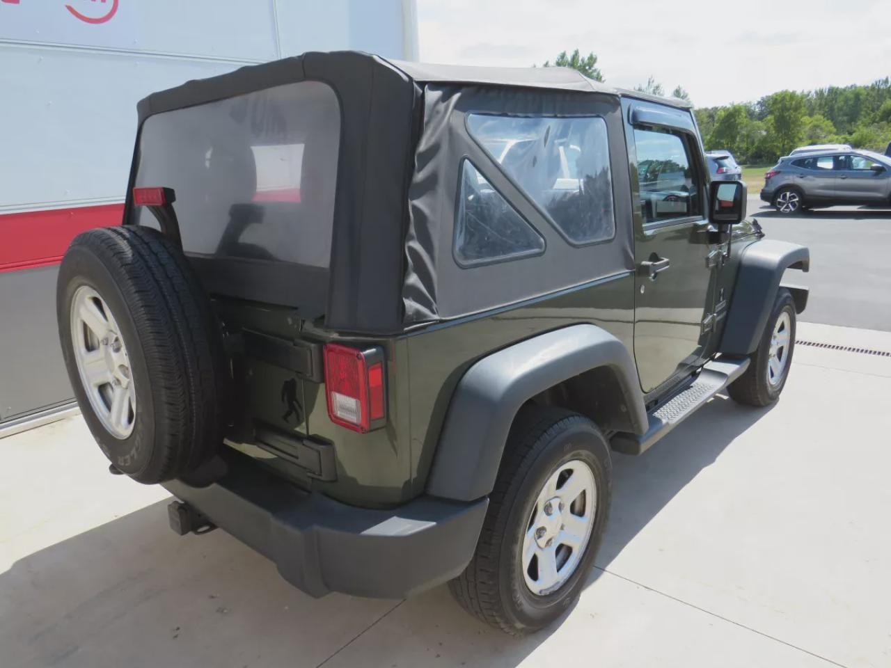 2015 Jeep Wrangler Sport (**SAFETY/CERTIFIED!!**MANUAL TRANSMISSION**4WD**ALLOY RIMS**RUNNING BOARDS**TRAILER HITCH**SOFT TOP**CUSTOM JEEP RUBBER FLOOR MATS**CRUISE CONTROL**) Photo