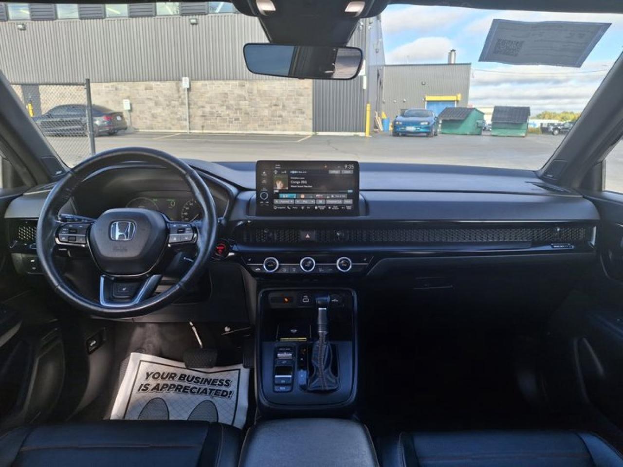 2024 Honda CR-V Hybrid Touring Hybrid | Leather | Sunroof | Nav | Heated Wheel + Seats | CarPlay + Android | and More ! Photo