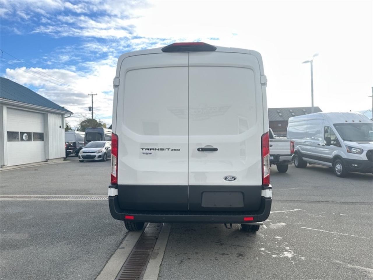 2026 Ford Transit Cargo Van T-250 148 Med Roof Photo3