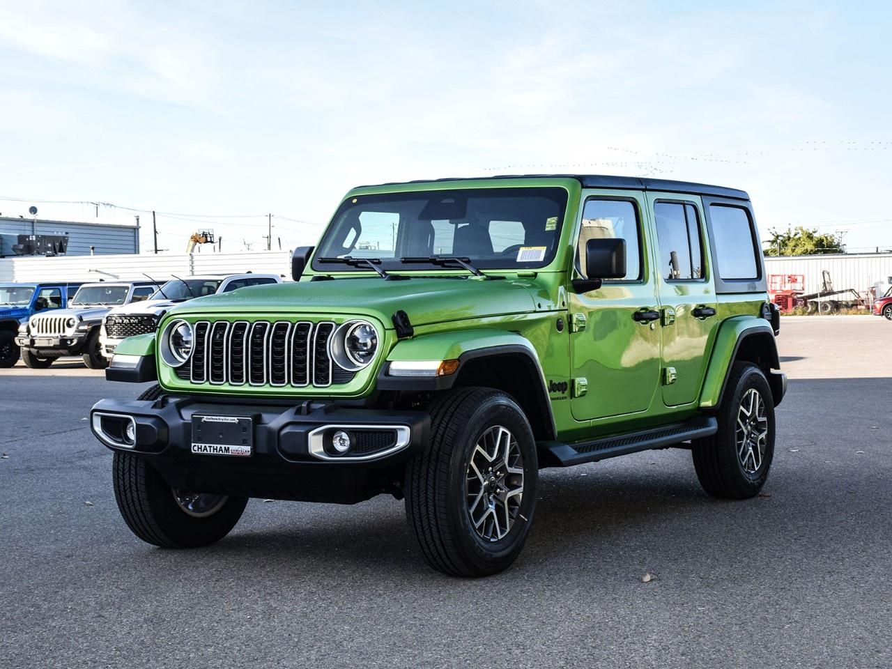 <p>Embrace adventure in the <strong>2026 Jeep Wrangler Sahara 4 Door 4x4</strong>, featuring an eye-catching <strong>Green</strong> exterior. This new SUV is designed for those who value both style and capability, equipped with a 4x4 drivetrain that ensures exceptional handling on any terrain.</p><p>The Wrangler's rugged exterior is complemented by a unique <strong>Green</strong> interior, blending comfort with a distinct sense of style. Standard features include air conditioning, alloy wheels, and a functional backup camera, designed to make each drive as pleasant as it is captivating.</p><p>Inside, you'll find cutting-edge technology like Bluetooth connection and smart device integration, keeping you connected wherever you go. Safety is a priority with brake assist and a heated steering wheel at your fingertips. Enjoy the convenience of adaptive cruise control for those long drives, all integrated into a plush interior featuring heated seats.</p><p>Perfect for thrill-seekers and families alike, this Jeep Wrangler offers the ultimate blend of style, comfort, and durability. Don't miss out on this incredible vehicle. <strong>Contact us today</strong> to learn more and arrange a test drive!</p>