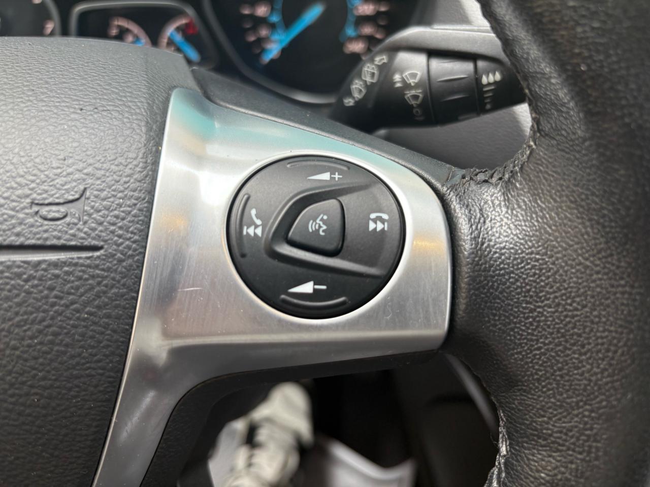 12971205