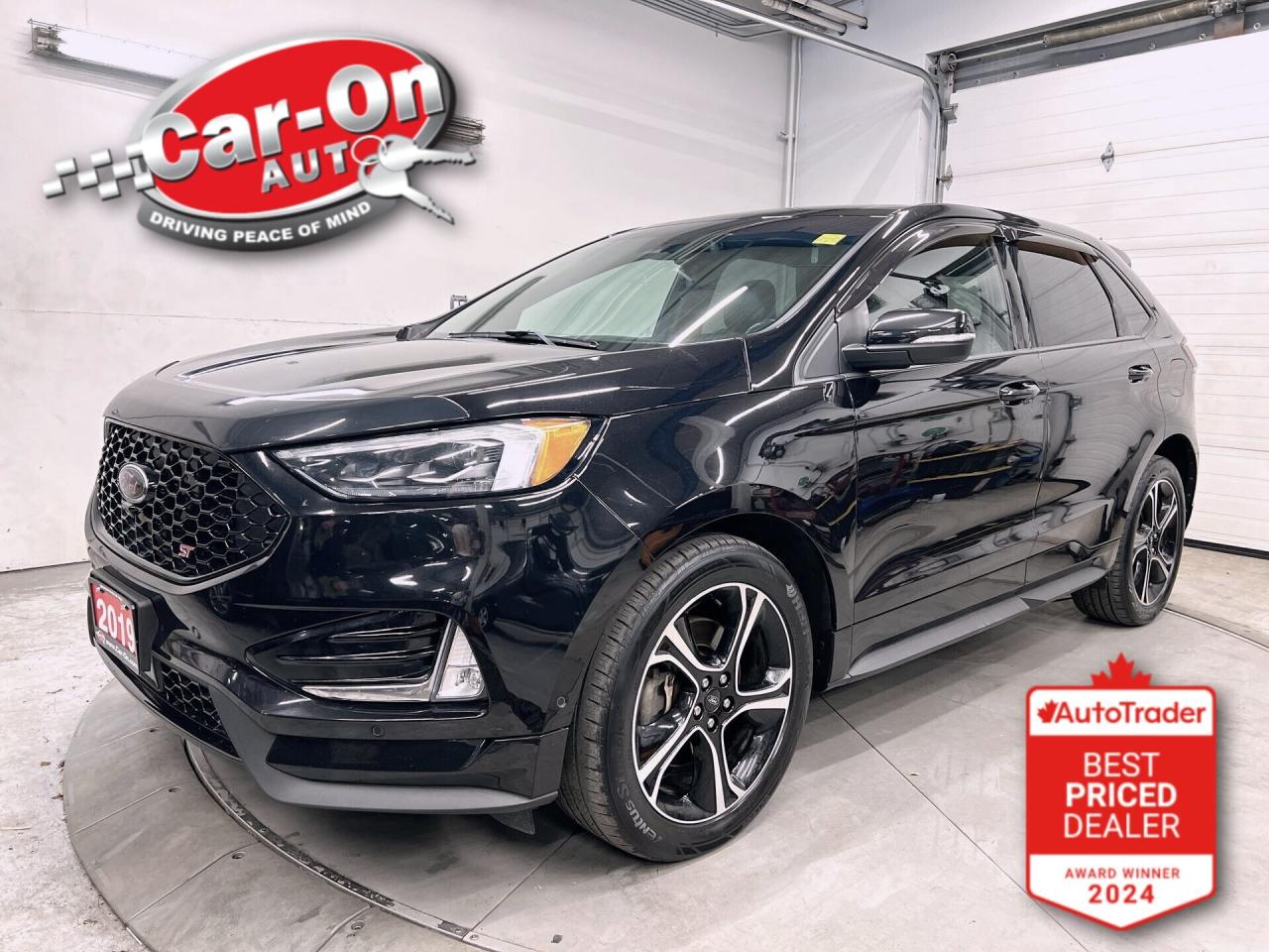ONLY 69,000KMS!! LOADED ST ALL-WHEEL DRIVE W/ 335HP ECOBOOST!!! Leather, panoramic sunroof, active park assist, 20-inch black alloys, Android Auto/Apple CarPlay, adaptive cruise control, blind spot monitor, rear cross-traffic alert, pre-collision system, lane departure warning, backup camera w/ front & rear park sensors, Ford Performance-tuned suspension, active noise control, heated/cooled front seats & heated rear seats, remote start, navigation, premium Bang & Olufsen audio system, wireless charger, rain-sensing wipers, dual-zone climate control, keyless entry w/ push start, hitch, power liftgate, power adjustable steering column, full power group incl. power driver & passenger seats w/ driver memory, auto-dimming rearview mirror, garage door opener, automatic headlights, Bluetooth and Sirius XM!!