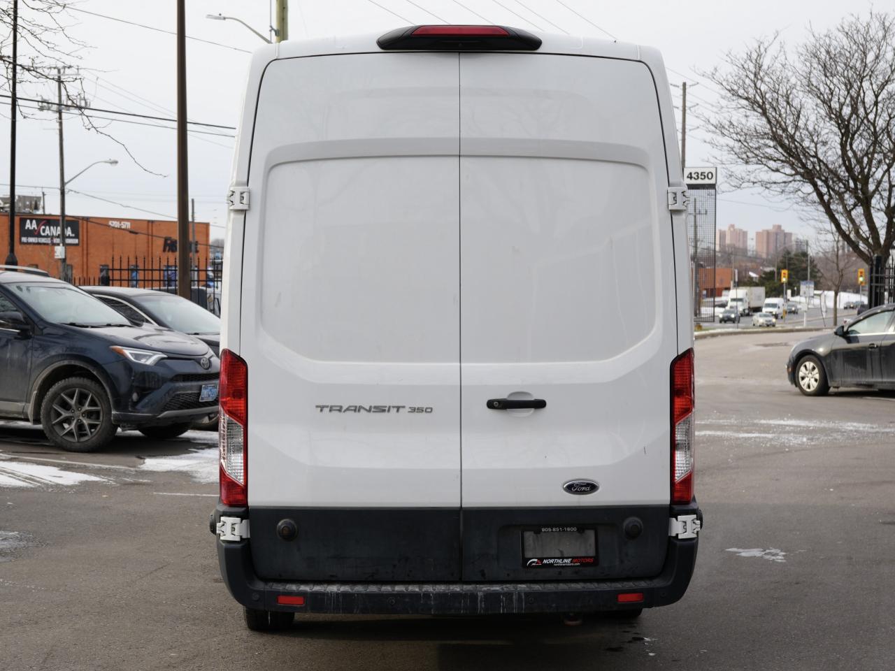 2021 Ford Transit Cargo Van T-350 148  EL Hi Rf 9500 GVWR RWD Photo