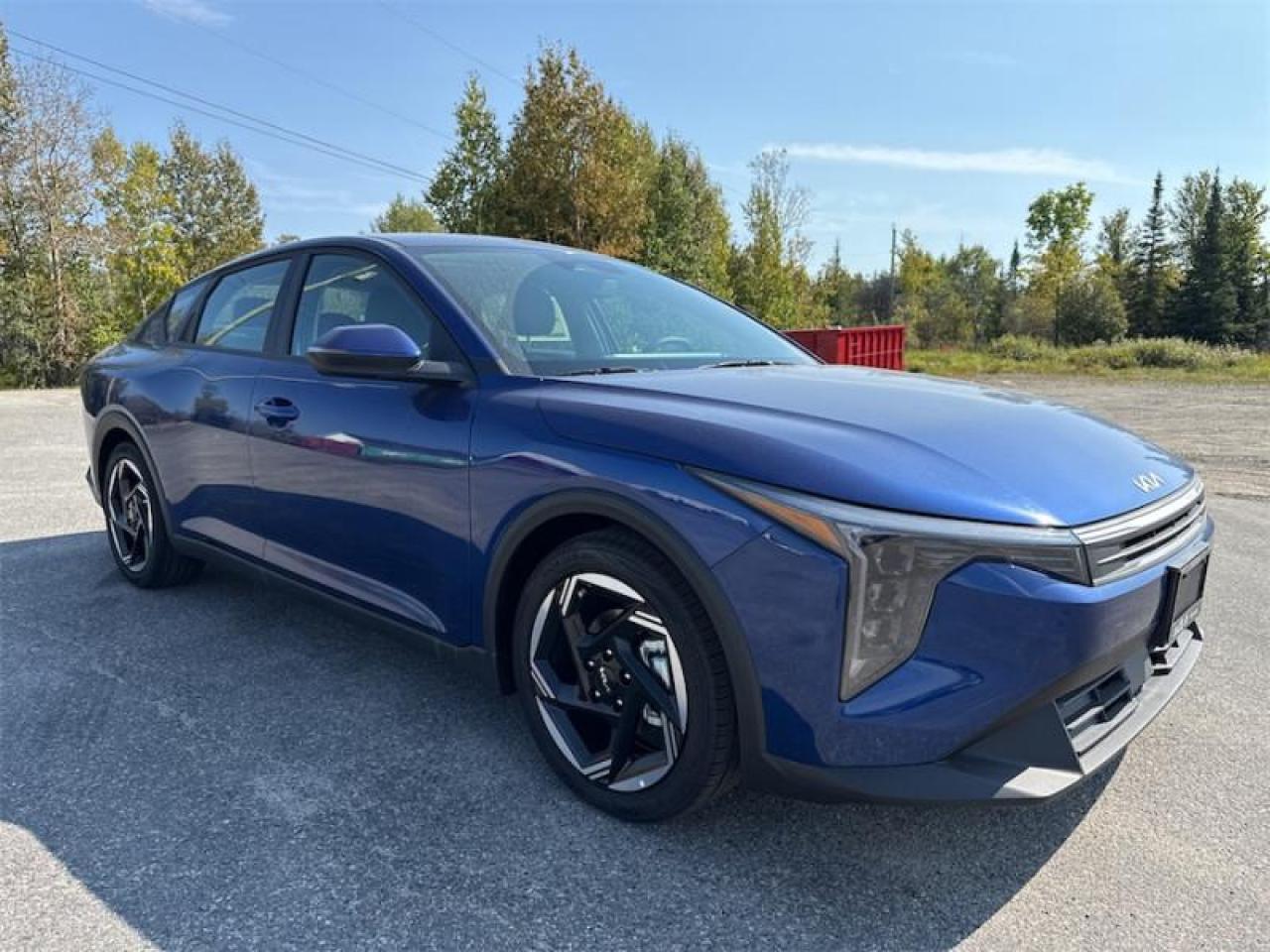 <b>Heated Seats, Lane Keep Assist, Wireless Apple Carplay and Android Auto, Blind Spot Detection, 17 Alloy Wheels, 12.3 Multimedia Interface, Wireless Phone Charger,  Side-View Mirror Turn Signals! <br> <br></b><br>  <br> <br>  This 2025 Kia K4 offers endless thrills, with practicality and versatility. <br> <br>Unleash your need for daily exhilaration in this inspired 2025 Kia K4. Built to never compromise, this compact yet surprising Forte is ready to grow with you into your busy life. Inspiration born in motion wakes up our desire for excitement, and this vehicle was built to perform, not conform. For break from the sameness, check out this 2025 K4.<br> <br> This azure blue sedan  has an automatic transmission and is powered by a  147HP 2.0L 4 Cylinder Engine.<br> <br> Our K4s trim level is EX. Standard features include heated front seats and a heated steering wheel, remote engine start, smart cruise control, and a 12.3-inch infotainment screen with Kia Connect, Apple CarPlay and Android Auto. Also included are a host of safety features such as blind spot monitoring, lane keep assist with lane departure warning, collision mitigation, and Kia Connect SOS. This vehicle has been upgraded with the following features: Heated Steering Wheel,  Blind Spot Monitoring,  Heated Seats,  Adaptive Cruise Control,  Remote Start,  Lane Keep Assist,  Collision Mitigation. <br><br> <br>To apply right now for financing use this link : <a href=https://www.kiaoftimmins.com/timmins-ontario-car-loan-application target=_blank>https://www.kiaoftimmins.com/timmins-ontario-car-loan-application</a><br><br> <br/> See dealer for details. <br> <br>As a local, family owned and operated dealership we look to be your number one place to buy your new vehicle! Kia of Timmins has been serving a large community across northern Ontario since 2001 and focuses highly on customer satisfaction. Our #1 priority is to make you feel at home as soon as you step foot in our dealership. Family owned and operated, our business is in Timmins, Ontario the city with the heart of gold. Also positioned near many towns in which we service such as: South Porcupine, Porcupine, Gogama, Foleyet, Chapleau, Wawa, Hearst, Mattice, Kapuskasing, Moonbeam, Fauquier, Smooth Rock Falls, Moosonee, Moose Factory, Fort Albany, Kashechewan, Abitibi Canyon, Cochrane, Iroquois falls, Matheson, Ramore, Kenogami, Kirkland Lake, Englehart, Elk Lake, Earlton, New Liskeard, Temiskaming Shores and many more.We have a fresh selection of new & used vehicles for sale for you to choose from. If we dont have what you need, we can find it! All makes and models are within our reach including: Dodge, Chrysler, Jeep, Ram, Chevrolet, GMC, Ford, Honda, Toyota, Hyundai, Mitsubishi, Nissan, Lincoln, Mazda, Subaru, Volkswagen, Mini-vans, Trucks and SUVs.<br><br>We are located at 1285 Riverside Drive, Timmins, Ontario. Too far way? We deliver anywhere in Ontario and Quebec!<br><br>Come in for a visit, call 1-800-661-6907 to book a test drive or visit <a href=https://www.kiaoftimmins.com>www.kiaoftimmins.com</a> for complete details. All prices are plus HST and Licensing.<br><br>We look forward to helping you with all your automotive needs!<br> o~o