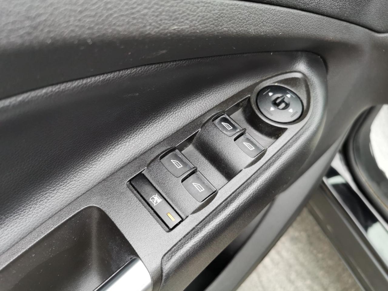 12977185