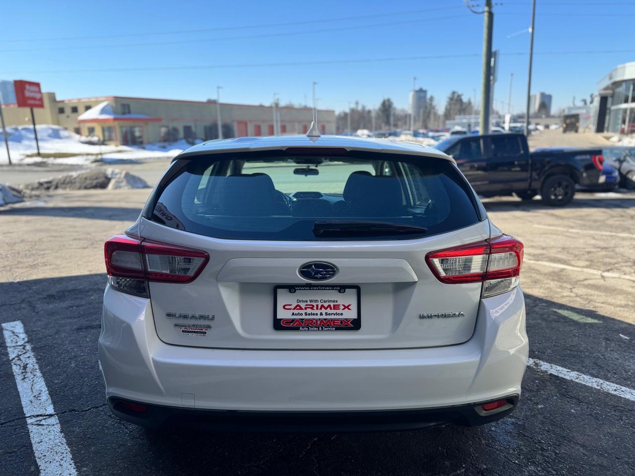 2018 Subaru Impreza Touring Sunroof | BSM | Backup Camera | Heated Seats | Apple Car Play | Android Auto Photo