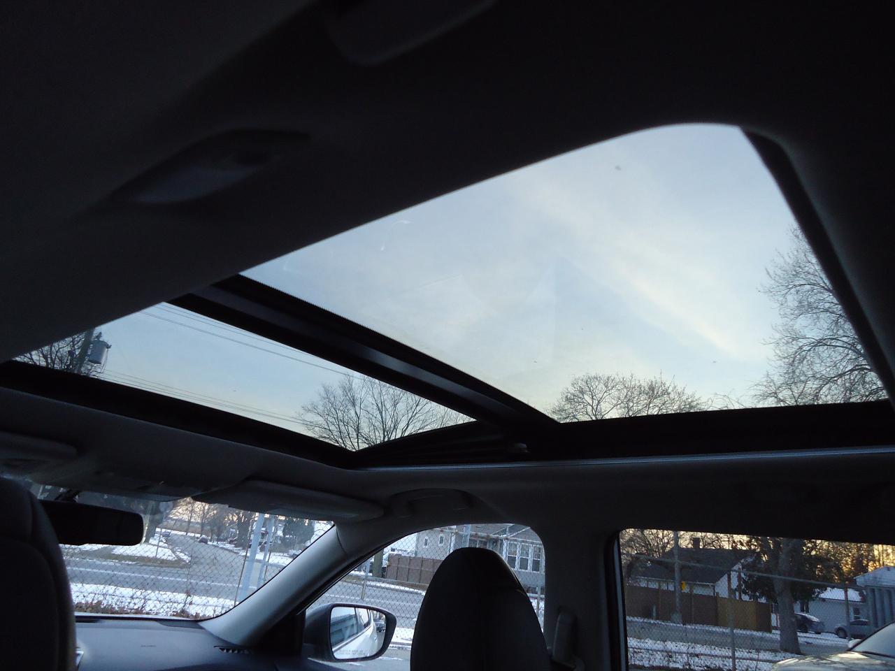 2015 Nissan Rogue AWD 4dr S Photo4