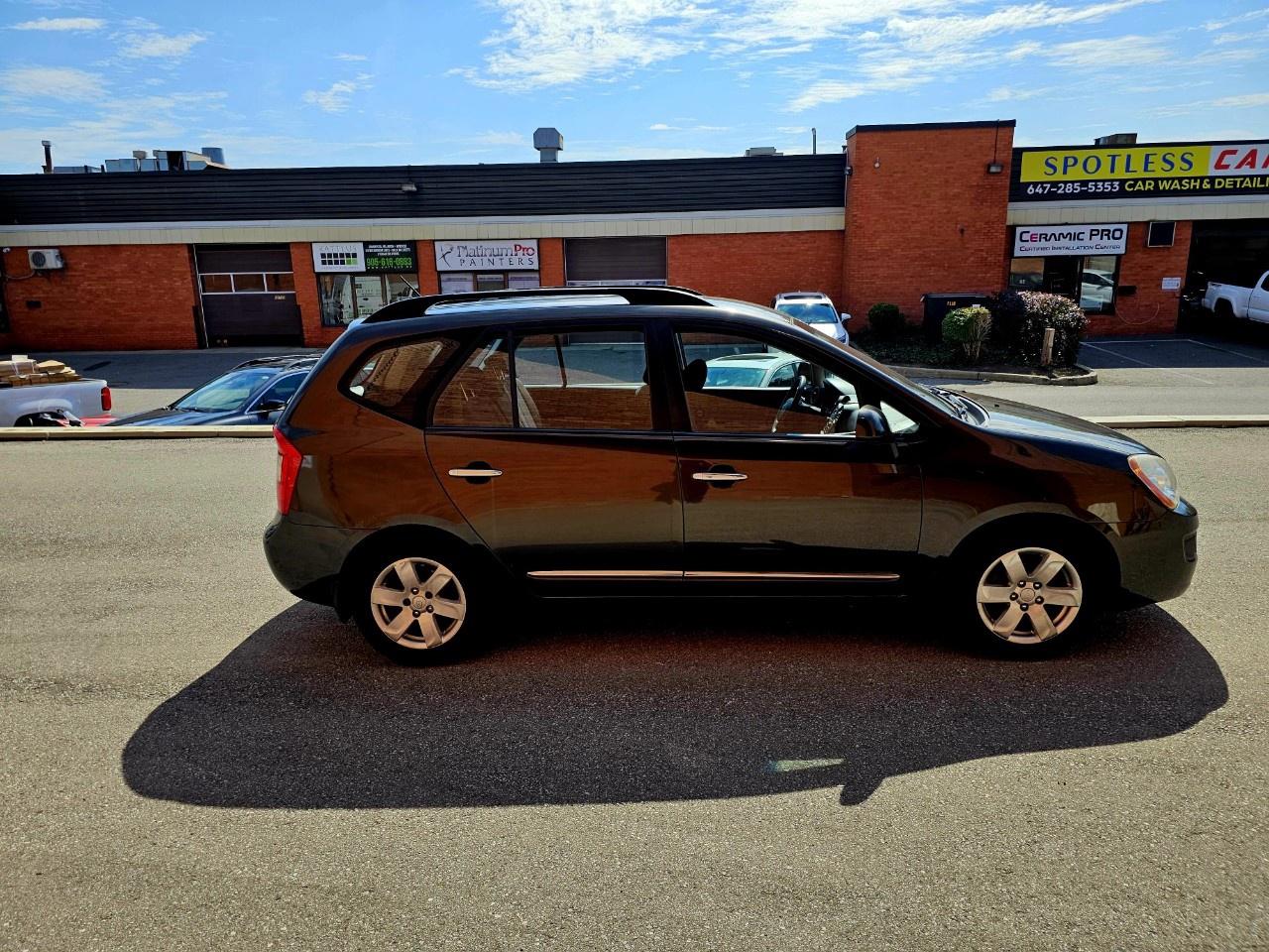 2009 Kia Rondo 4dr Wgn V6 EX Photo3