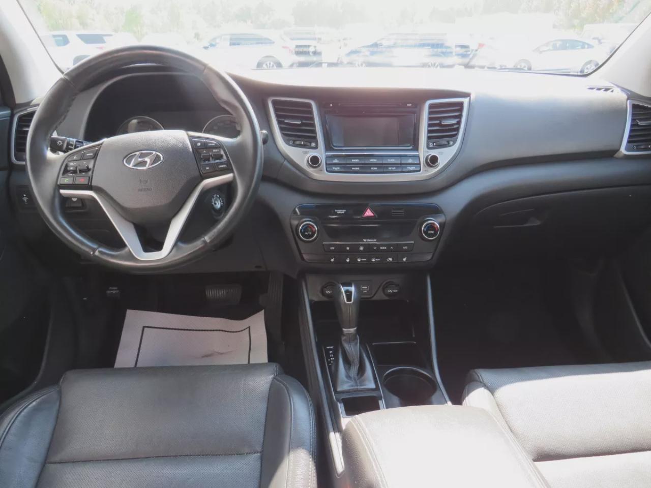 2017 Hyundai Tucson SE  (**SAFETY/CERTIFIED!!**AWD**ALLOY RIMS**LEATHER**POWER SEATS**PANORAMIC SUNROOF**HEATED STEERING WHEEL**BLIND SPOT MONITORING**FRONT AND REAR HEATED SEATS**USB**DIGITAL TOUCHSCREEN**BLUETOOTH**CRUISE CONTROL**) Photo