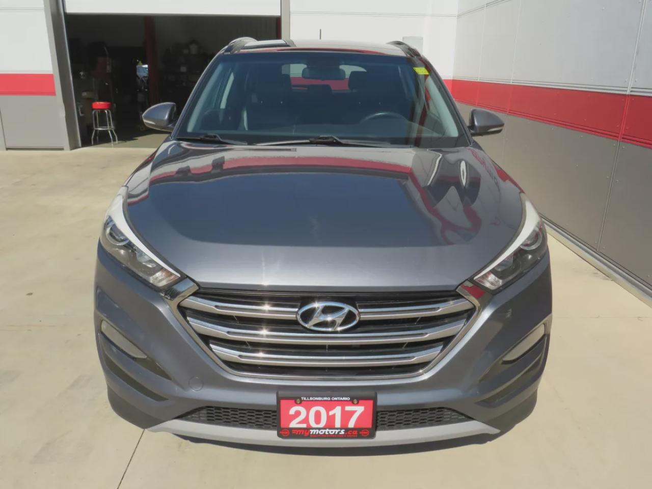 2017 Hyundai Tucson SE  (**SAFETY/CERTIFIED!!**AWD**ALLOY RIMS**LEATHER**POWER SEATS**PANORAMIC SUNROOF**HEATED STEERING WHEEL**BLIND SPOT MONITORING**FRONT AND REAR HEATED SEATS**USB**DIGITAL TOUCHSCREEN**BLUETOOTH**CRUISE CONTROL**) Photo
