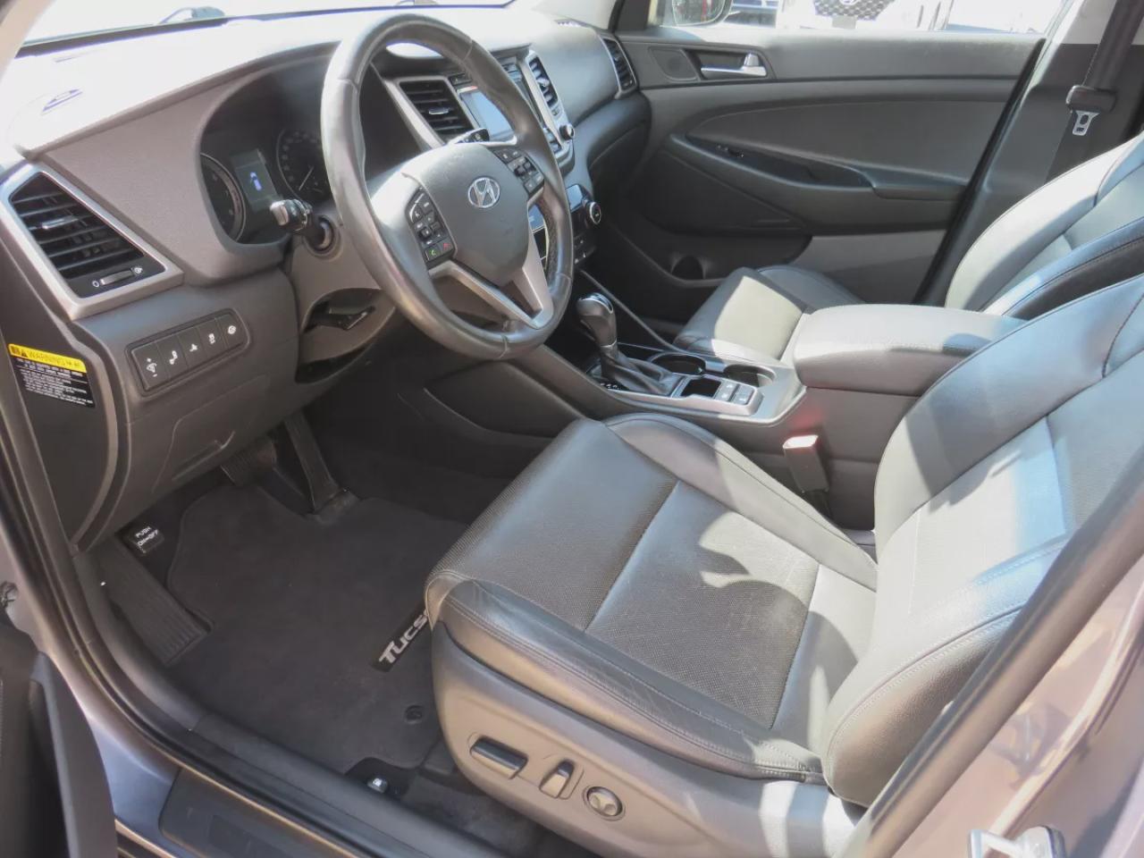 2017 Hyundai Tucson SE  (**SAFETY/CERTIFIED!!**AWD**ALLOY RIMS**LEATHER**POWER SEATS**PANORAMIC SUNROOF**HEATED STEERING WHEEL**BLIND SPOT MONITORING**FRONT AND REAR HEATED SEATS**USB**DIGITAL TOUCHSCREEN**BLUETOOTH**CRUISE CONTROL**) Photo