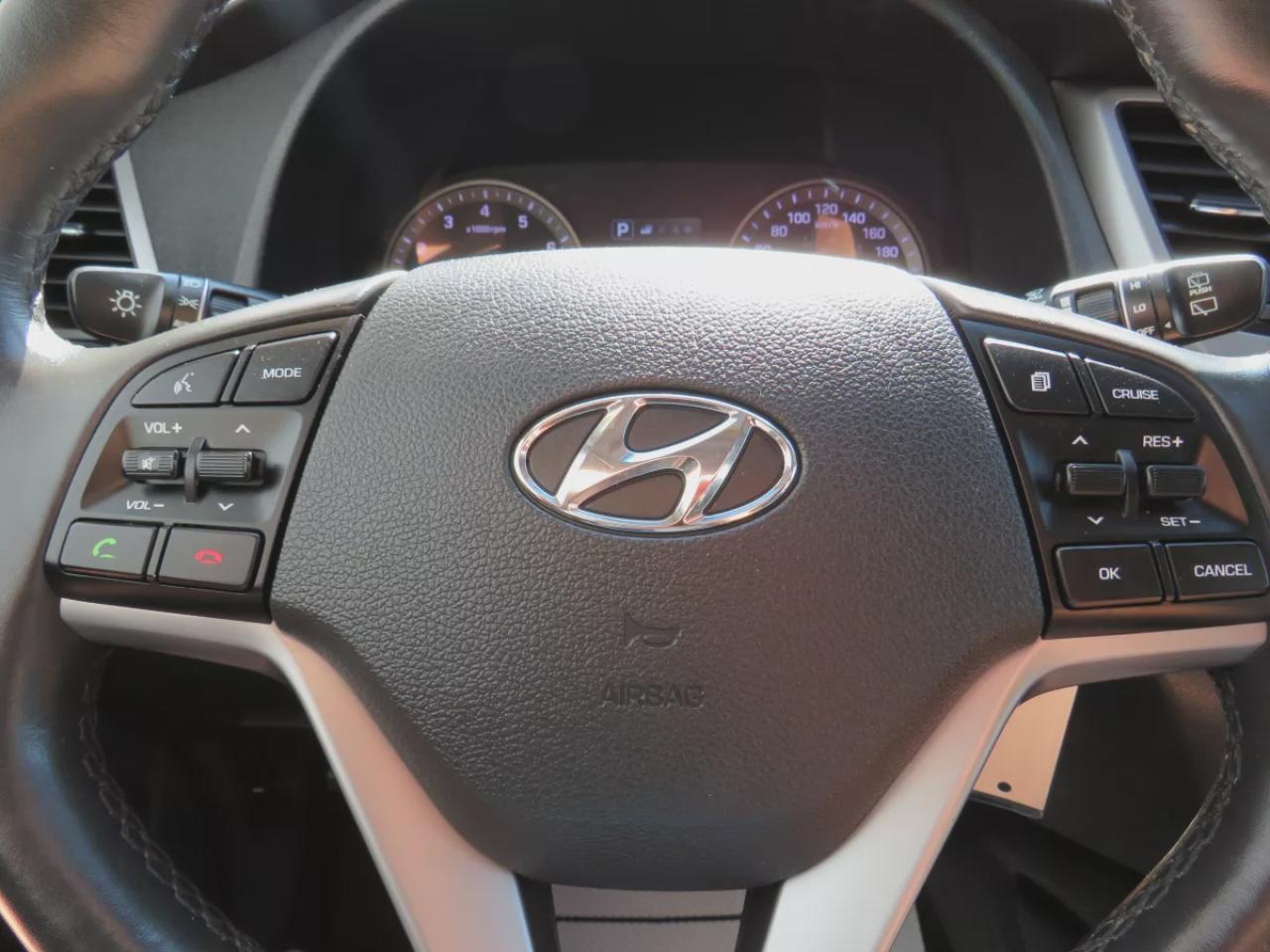 2017 Hyundai Tucson SE  (**SAFETY/CERTIFIED!!**AWD**ALLOY RIMS**LEATHER**POWER SEATS**PANORAMIC SUNROOF**HEATED STEERING WHEEL**BLIND SPOT MONITORING**FRONT AND REAR HEATED SEATS**USB**DIGITAL TOUCHSCREEN**BLUETOOTH**CRUISE CONTROL**) Photo