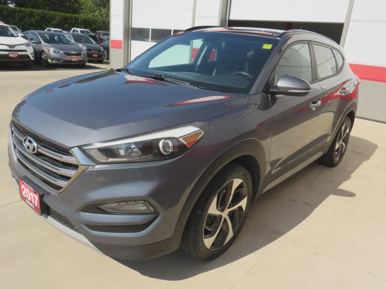 2017 Hyundai Tucson SE  (**SAFETY/CERTIFIED!!**AWD**ALLOY RIMS**LEATHER**POWER SEATS**PANORAMIC SUNROOF**HEATED STEERING WHEEL**BLIND SPOT MONITORING**FRONT AND REAR HEATED SEATS**USB**DIGITAL TOUCHSCREEN**BLUETOOTH**CRUISE CONTROL**) Photo