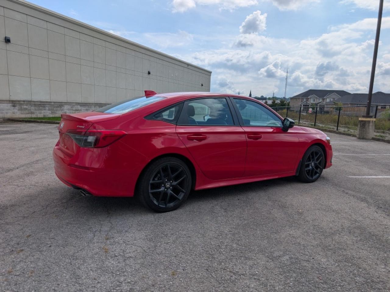 2023 Honda Civic Sedan Sport  **BRIGHT RED - SUNROOF** Photo