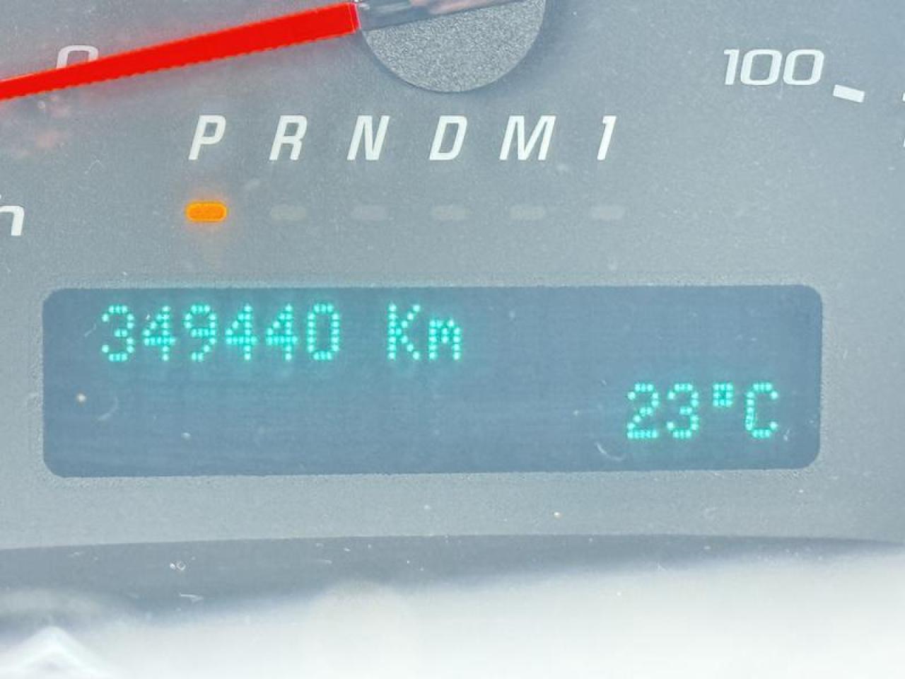 12980629
