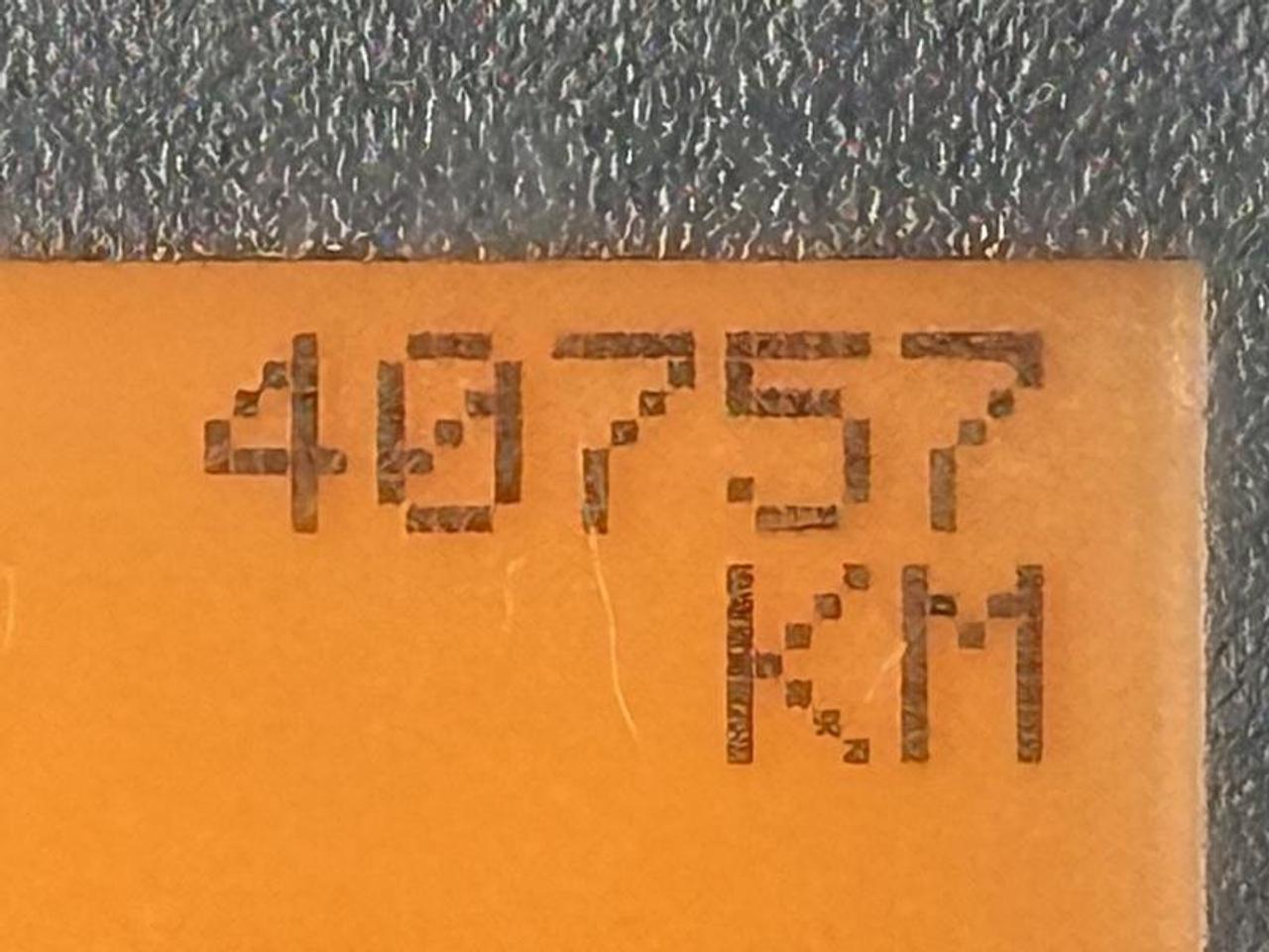 12980635