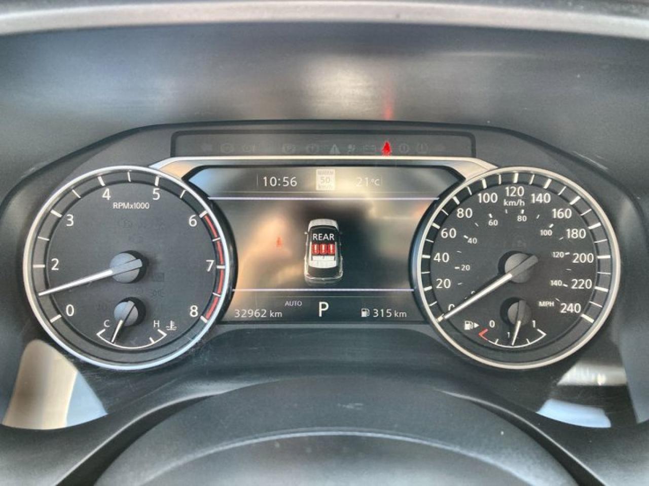12981700