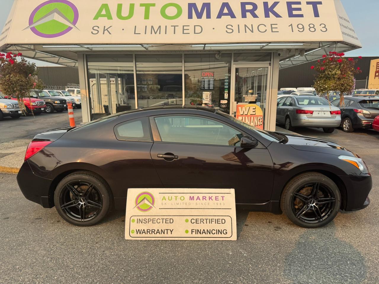 CALL OR TEXT KARL @ 6-0-4-2-5-0-8-6-4-6 FOR INFO & TO CONFIRM WHICH LOCATION.<br /><br />BEAUTIFUL CONDITION WELL CARED FOR NISSAN ALTIMA S COUPE WITH BRAND NEW TIRES AND RIMS! BRAKES HAVE 60% REMAINING FRONT AND REAR AND EVERYTHING ELSE CHECKED OUT IN EXCELLENT CONDITION. LOCAL, 2 OWNER CAR WITH NO ACCIDENTS EVER. IT COMES WITH A SECOND SET OF SNOW TIRES ON RIMS TOO! HEATED LEATHER SEATS, BLUETOOTH AND BACK UP CAMERA AS WELL. FULL SERVICE HISTORY ON THE CARFAX. YOU WON'T FIND A CLEANER ALTIMA COUPE, STOP BY TODAY FOR A TEST DRIVE.&nbsp;<br /><br />2 LOCATIONS TO SERVE YOU, BE SURE TO CALL FIRST TO CONFIRM WHERE THE VEHICLE IS.<br /><br />We are a family owned and operated business for 40 years. Since 1983 we have been committed to offering outstanding vehicles backed by exceptional customer service, now and in the future. Whatever your specific needs may be, we will custom tailor your purchase exactly how you want or need it to be. All you have to do is give us a call and we will happily walk you through all the steps with no stress and no pressure.<br /><br />&nbsp; &nbsp; &nbsp; &nbsp; &nbsp; &nbsp; &nbsp; &nbsp; &nbsp; &nbsp; &nbsp; &nbsp; &nbsp; &nbsp; &nbsp; &nbsp; &nbsp; &nbsp; &nbsp; &nbsp; &nbsp; &nbsp; WE ARE THE HOUSE OF YES!<br /><br />ADDITIONAL BENEFITS WHEN BUYING FROM SK AUTOMARKET:<br /><br />-ON SITE FINANCING THROUGH OUR 17 AFFILIATED BANKS AND VEHICLE&nbsp; &nbsp; &nbsp; &nbsp; &nbsp; &nbsp; &nbsp; &nbsp; &nbsp; &nbsp; &nbsp; &nbsp; &nbsp; &nbsp; &nbsp; &nbsp; &nbsp; &nbsp; &nbsp; &nbsp; &nbsp; &nbsp; &nbsp; &nbsp; &nbsp; &nbsp;FINANCE COMPANIES.<br />-IN HOUSE LEASE TO OWN PROGRAM.<br />-EVERY VEHICLE HAS UNDERGONE A 120 POINT COMPREHENSIVE INSPECTION.<br />-EVERY PURCHASE INCLUDES A FREE POWERTRAIN WARRANTY.<br />-EVERY VEHICLE INCLUDES A CARFAX AND ICBC DAMAGE REPORT.<br />-EVERY VEHICLE IS GUARANTEED LIEN FREE.<br />-DISCOUNTED RATES ON PARTS AND SERVICE FOR YOUR NEW CAR AND ANY OTHER&nbsp; &nbsp;FAMILY CARS THAT NEED WORK NOW AND IN THE FUTURE.<br />-40 YEARS IN THE VEHICLE SALES INDUSTRY.<br />-A+++ MEMBER OF THE BETTER BUSINESS BUREAU.<br />-RATED&nbsp;TOP DEALER BY CARGURUS 8 YEARS IN A ROW<br />-MEMBER&nbsp;IN GOOD STANDING WITH THE VEHICLE SALES AUTHORITY OF BRITISH&nbsp; &nbsp;COLUMBIA.<br />-MEMBER OF THE AUTOMOTIVE RETAILERS ASSOCIATION.<br />-COMMITTED CONTRIBUTOR TO OUR LOCAL COMMUNITY AND THE RESIDENTS OF BC.<br /> This vehicle has been Fully Inspected, Certified and Qualifies for Our Free Extended Warranty.Don't forget to ask about our Great Finance and Lease Rates. We also have a Options for Buy Here Pay Here and Lease to Own for Good Customers in Bad Situations. 2 locations to help you, White Rock and Langley. Be sure to call before you come to confirm the vehicles location and availability or look us up at www.automarketsales.com. White Rock 604-542-4970 and Langley 604-533-1310. Serving Surrey, Delta, Langley, Richmond, Vancouver, all of BC and western Canada. Financing & leasing available. CALL SK AUTOMARKET LTD. 6045424970. Call us toll-free at 1 877 813-6807. $999 Documentation fee (negotiable) and applicable taxes are in addition to advertised prices. LANGLEY LOCATION DEALER# 40038 S. SURREY LOCATION DEALER #9987