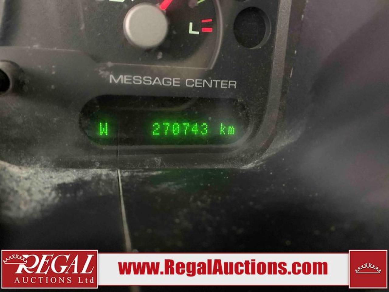 12989056