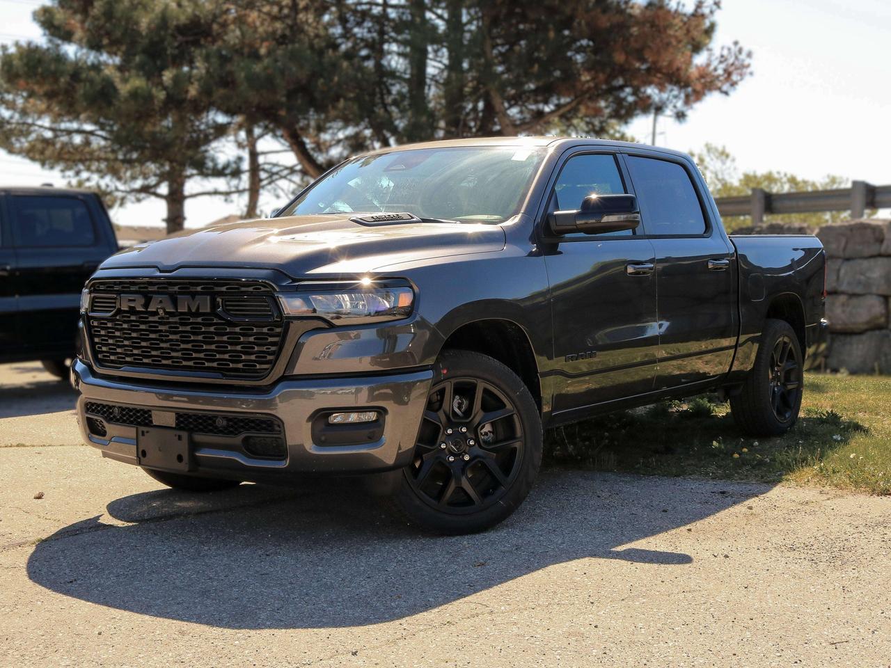 Bold and refined, our New 2026 RAM 1500 Sport Crew Cab 4X4 Night Edition in Granite Crystal Metallic delivers stylish strength that stands out anywhere. Motivated by a Twin-TurboCharged 3.0 Litre Hurricane 6 Cylinder generating 420hp for an 8 Speed Automatic transmission. This Four Wheel Drive truck loves to tow and haul with that setup, and it achieves approximately 9.7L/100km on the highway. Dynamic exterior details include LED lighting, fog lamps, body-color accents, 20-inch black alloy wheels, a damped tailgate, and heated power-folding mirrors. Our Sport cabin is specially crafted for active owners who prefer features like heated cloth front seats, 12-way power for the driver, a leather-wrapped steering wheel, dual-zone automatic climate control, power-adjustable pedals, remote start, keyless access/ignition, a powered rear window, and top-shelf technologies. The Uconnect&reg; infotainment system bundles a 12-inch touchscreen, a 12-inch driver display, full-colour navigation, voice recognition, Apple CarPlay&reg;, Android Auto&reg;, Bluetooth&reg;, and 10-speaker audio. RAM encourages safer trucking with automatic braking, forward collision warning, a surround-view camera system, trailer-compatible blind-spot monitoring, rear cross-traffic alert, trailer-sway damping, electronic stability/traction control, hill start assist, and more. Committed to truck leadership, our 1500 Sport is a compelling choice! Save this Page and Call for Availability. We Know You Will Enjoy Your Test Drive Towards Ownership!