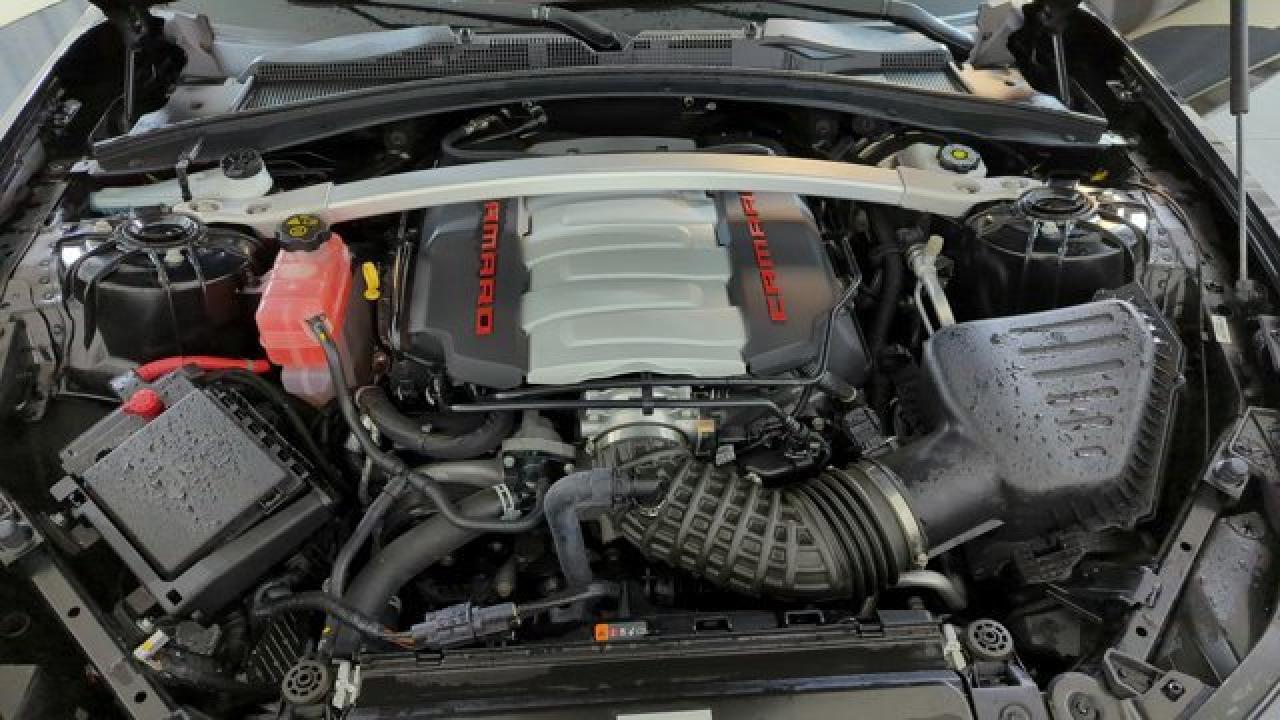 12990865