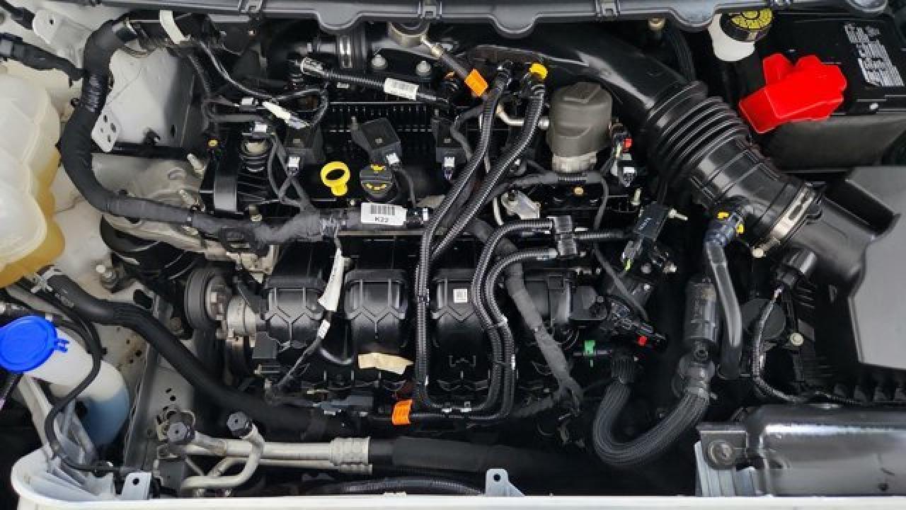 12990943