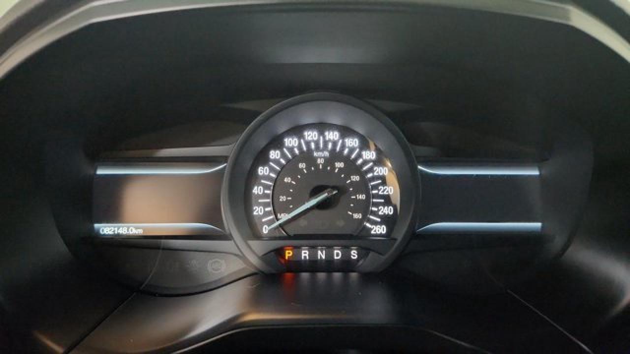 12990943